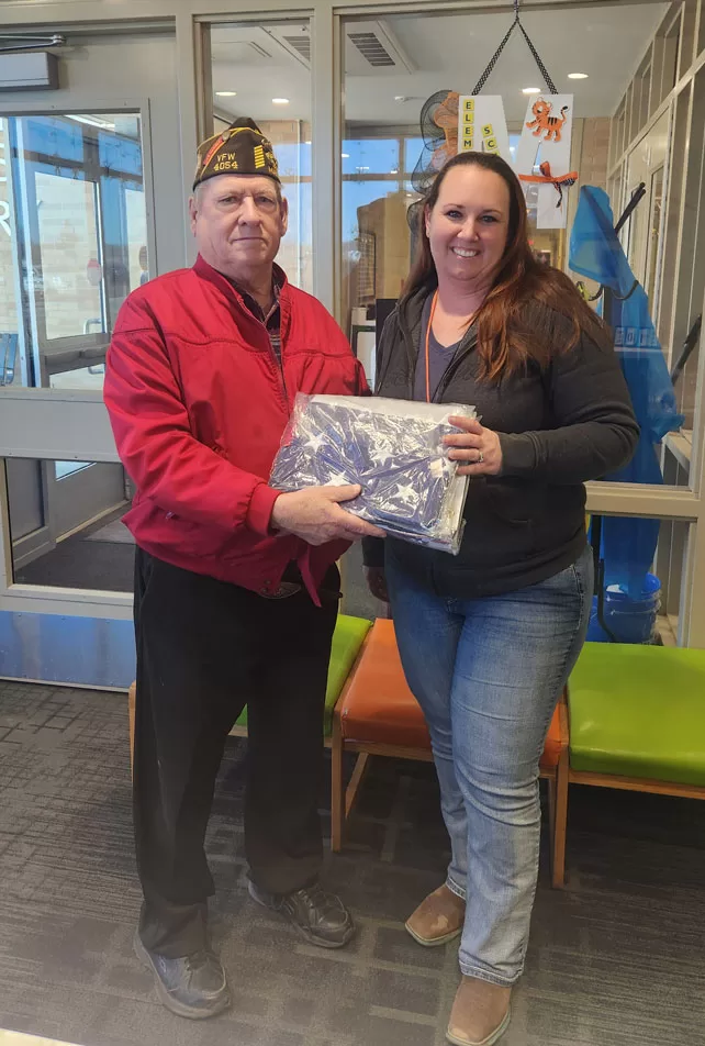WEB-Larry-Bones-donating-flags-to-us-from-VFW